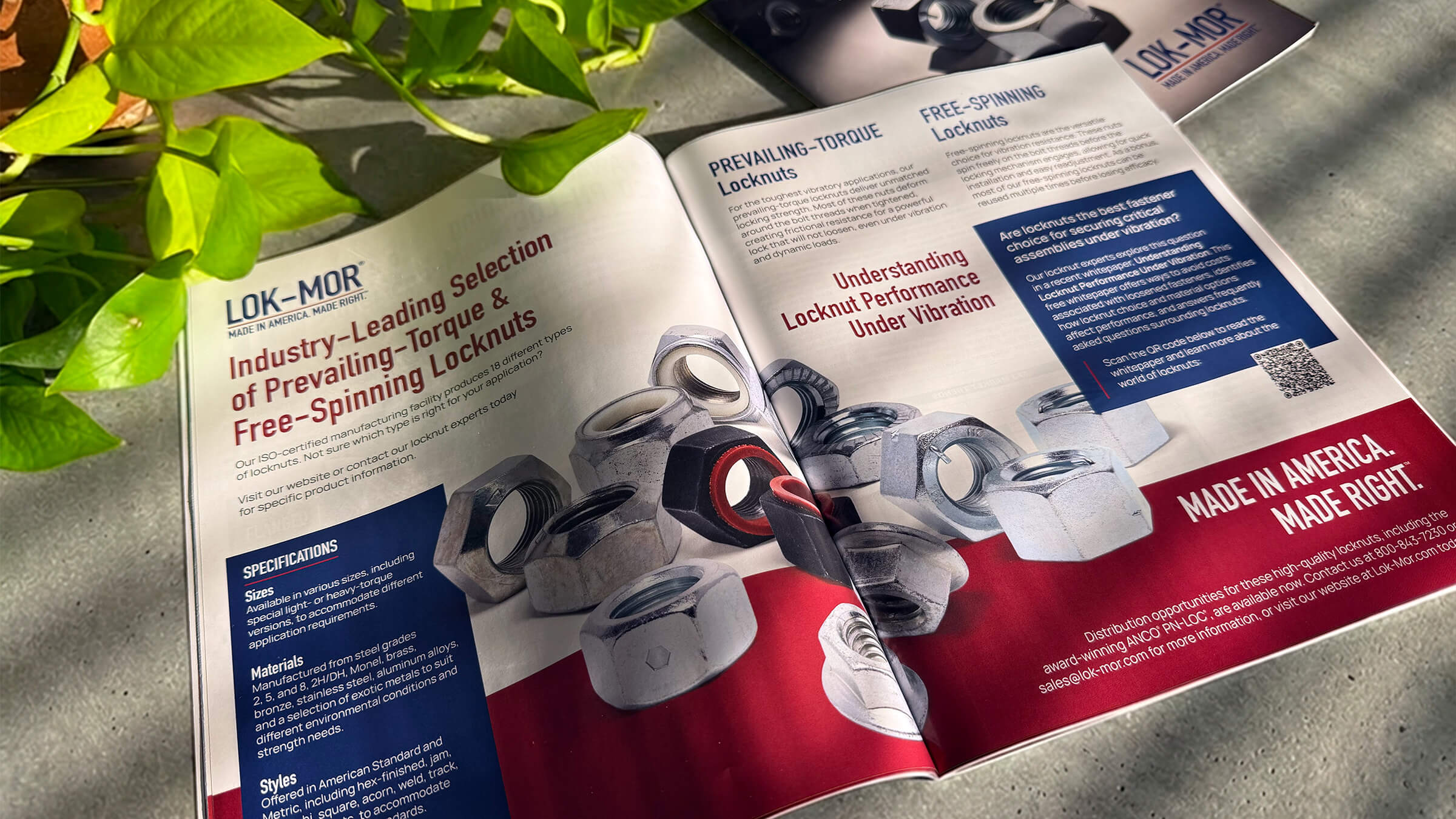 Open print publication featuring industrial locknuts, B2B marketing and sales enablement brochure layout.